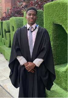 A student standing outside